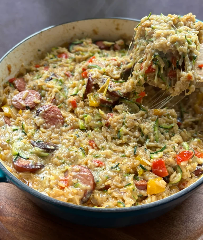 Pan of zucchini and sausage casserole in a skillet.