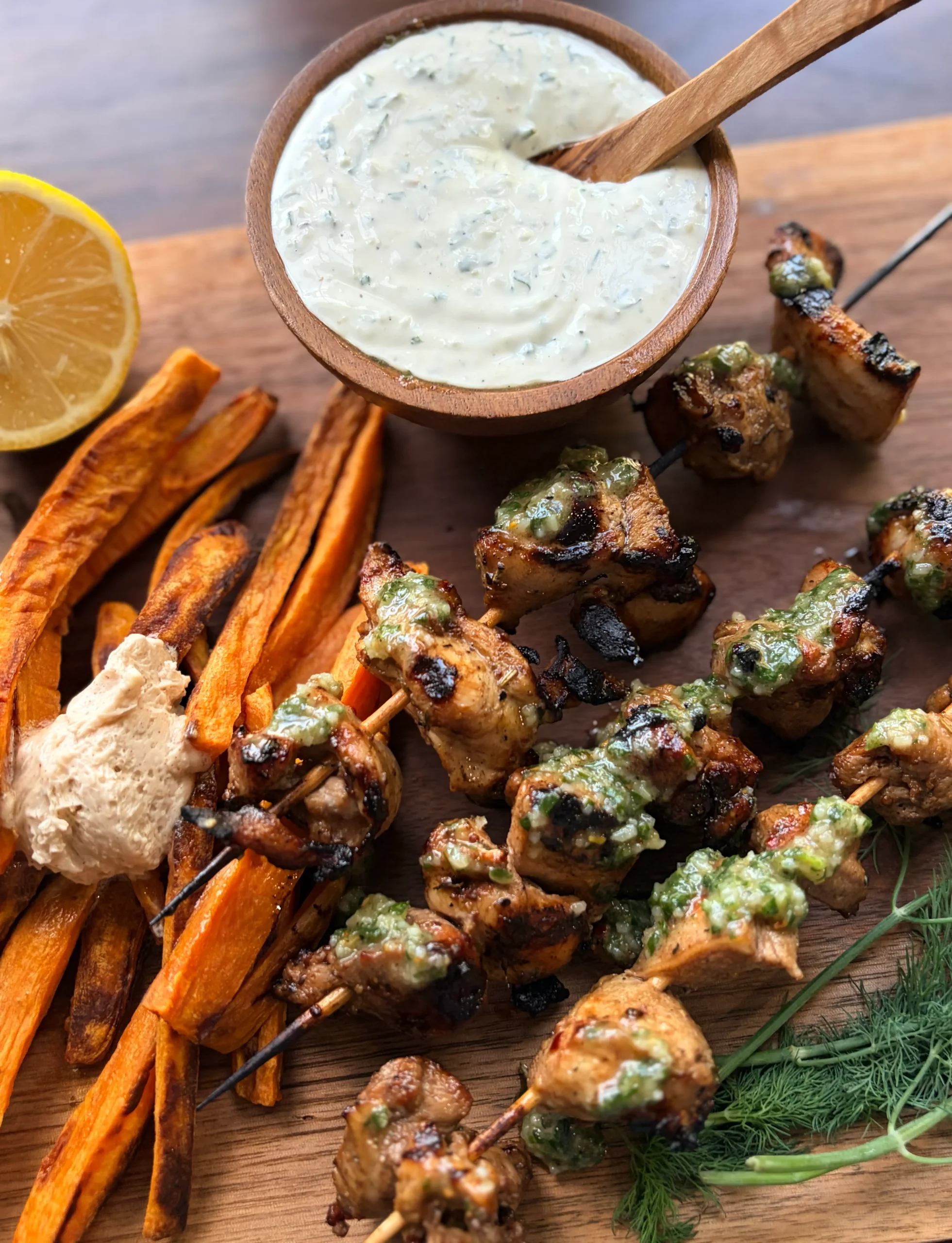 Pesto chicken skewers with herby pesto ranch dressing.