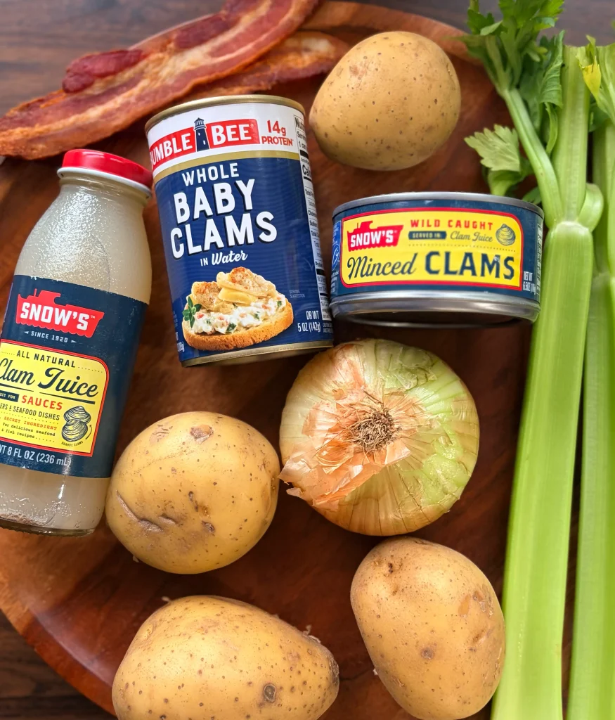Potato's, onions, celery, and assortment of canned clams and bottled clam juice.