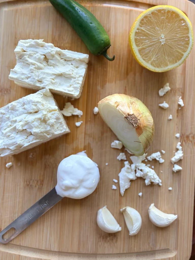 Feta chese, jalapeno, and white onion ingredients for whipped feta.
