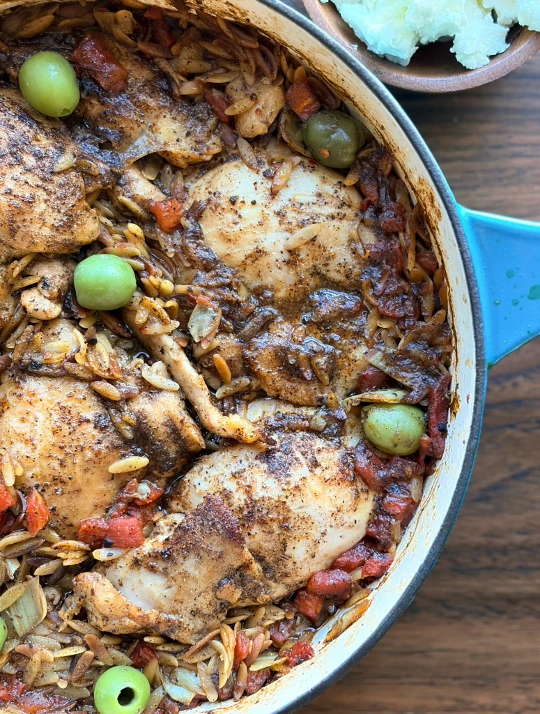 Braised chicken with orzo green olives and goat cheese.